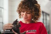 Dr. Annie, Purina pet behaviorist, holding a kitten.