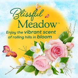 Cat litter packaging label highlighting Tidy Cats Blissful Meadow's vibrant scent of rolling hills in bloom.