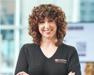 Dr. Annie in black shirt with Purina logo