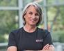 Deb in a black shirt with Purina logo